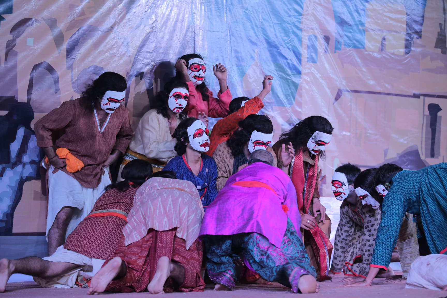 Masked figures of worldly temptation surround the soul in Bhav Prapanch